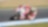 Pilote sur une superbike Ducati abordant un virage dans une course