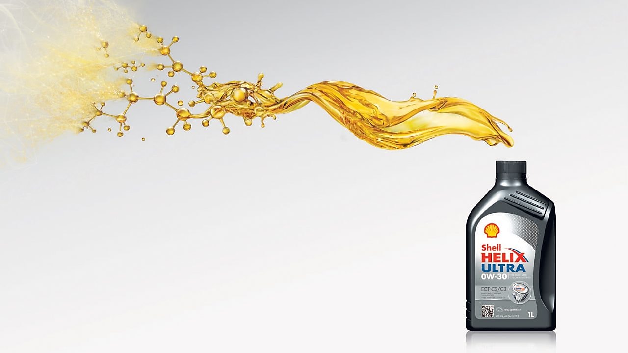 Sebastian Vettel et Kimi Raikkonen font le plein de voitures Ferrari à une station Shell