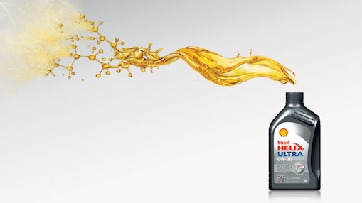 Sebastian Vettel et Kimi Raikkonen font le plein de voitures Ferrari à une station Shell