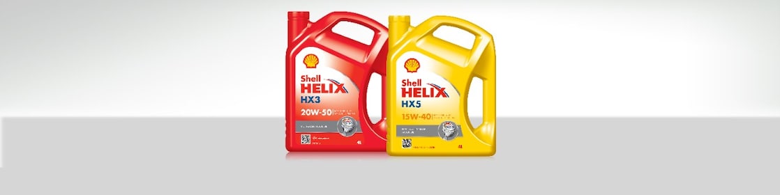 Deux bouteilles d'huiles minérales Shell Helix